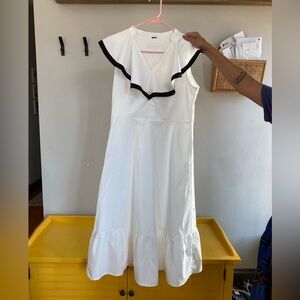 White Flounce Dress With Black Trimming